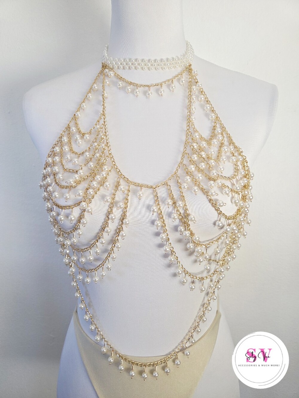 Gold chain and pearl body jewelry